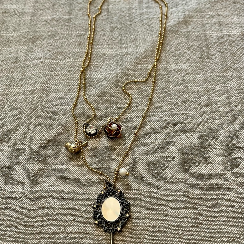 Betsey Johnson Gold and Silver Layered Necklace with Charms. Mirror Charm